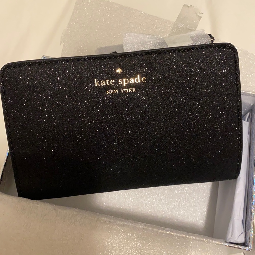 NWT. Kate spade black sparkly wallet